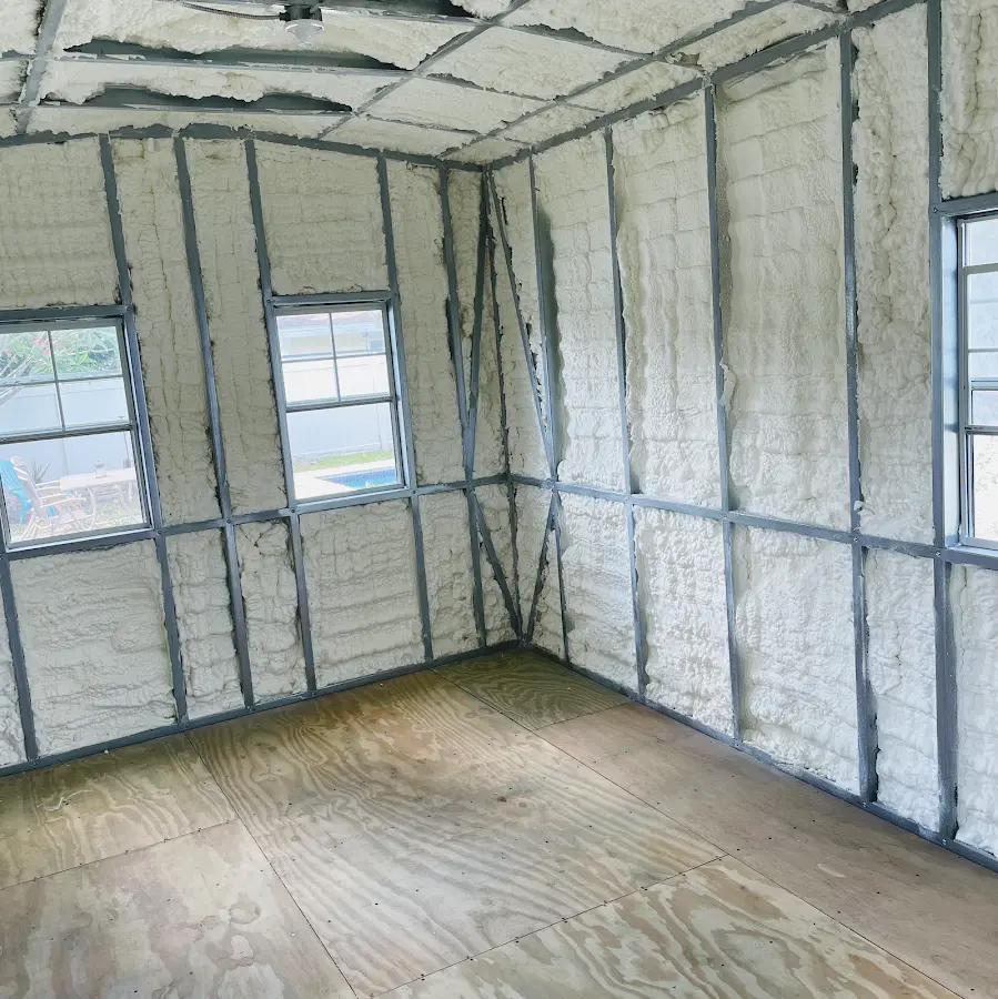 Closed-cell spray foam insulation applied to wall cavities in a residential project in Eugene